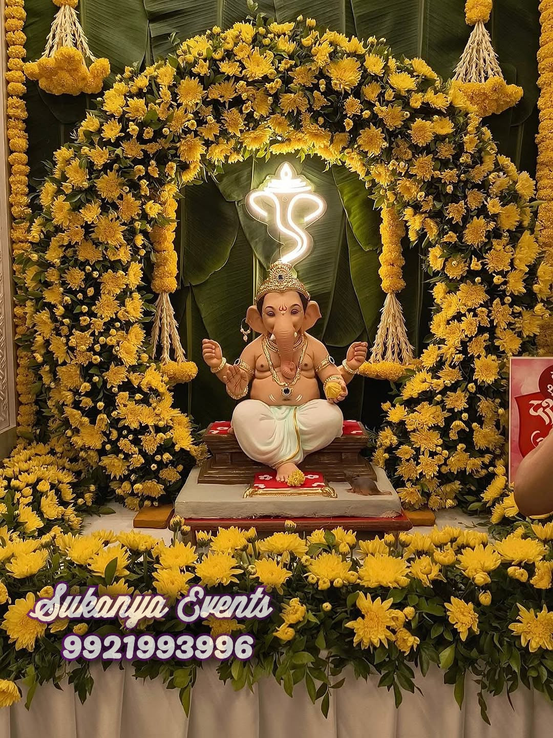 Excellent Yellow Real Flower Theme Ganpati Decoration At Home