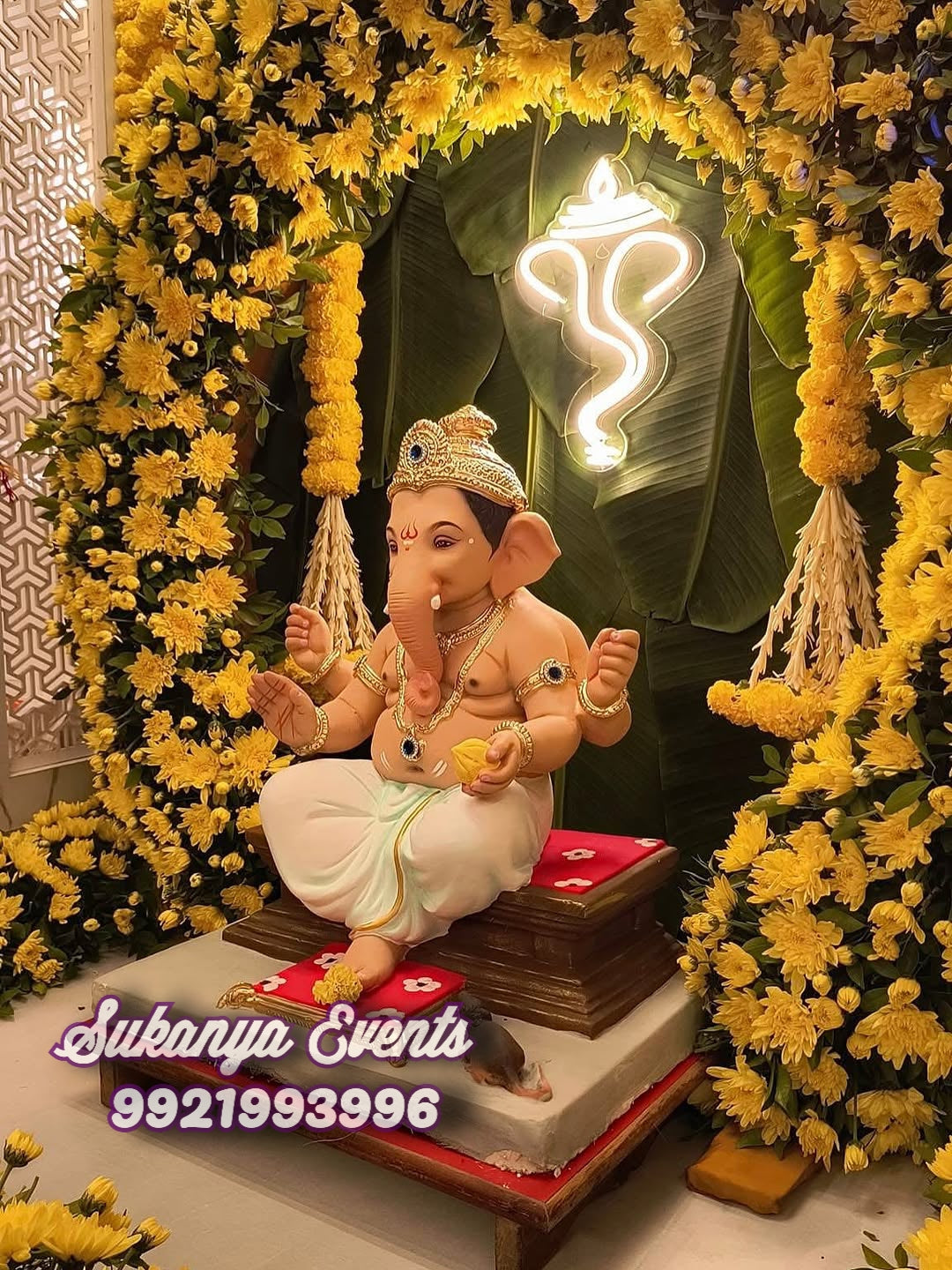 Excellent Yellow Real Flower Theme Ganpati Decoration At Home